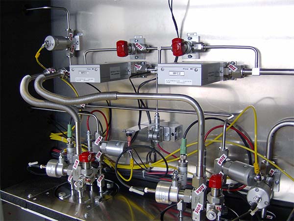 Vaporizer system for HMDSO and another precursor